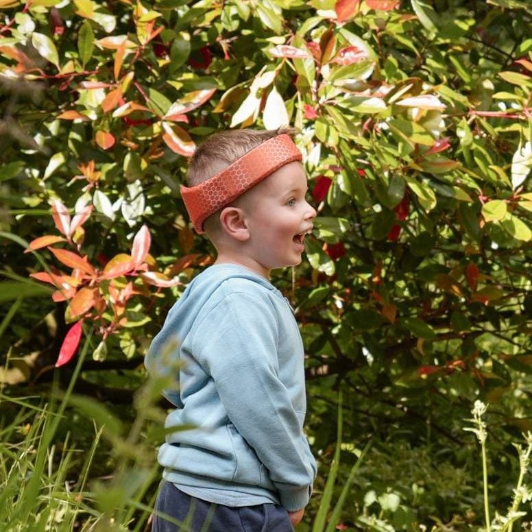 A toddler wearing Rezon Halos® adjunctive neuroprotection