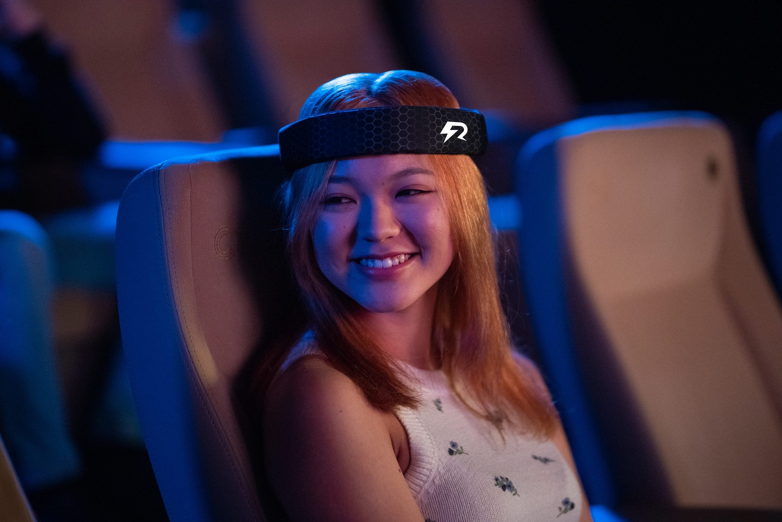 Rezon Halos® worn by a teen girl at the cinema.